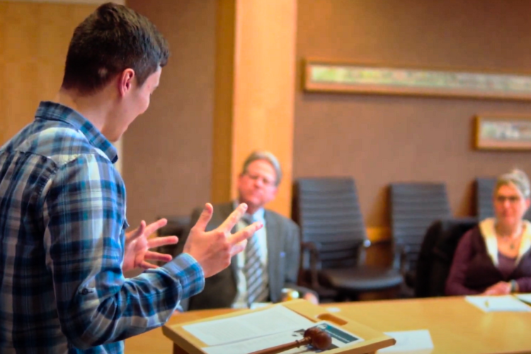 Image of male giving a speech