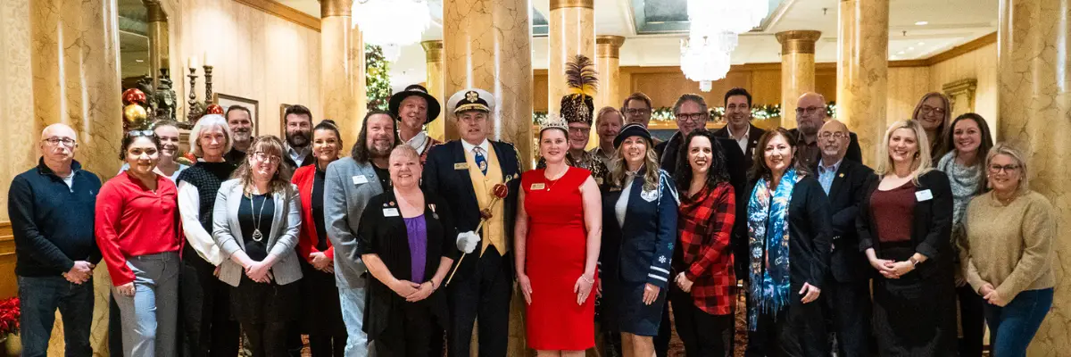 a group of people posing for a photo